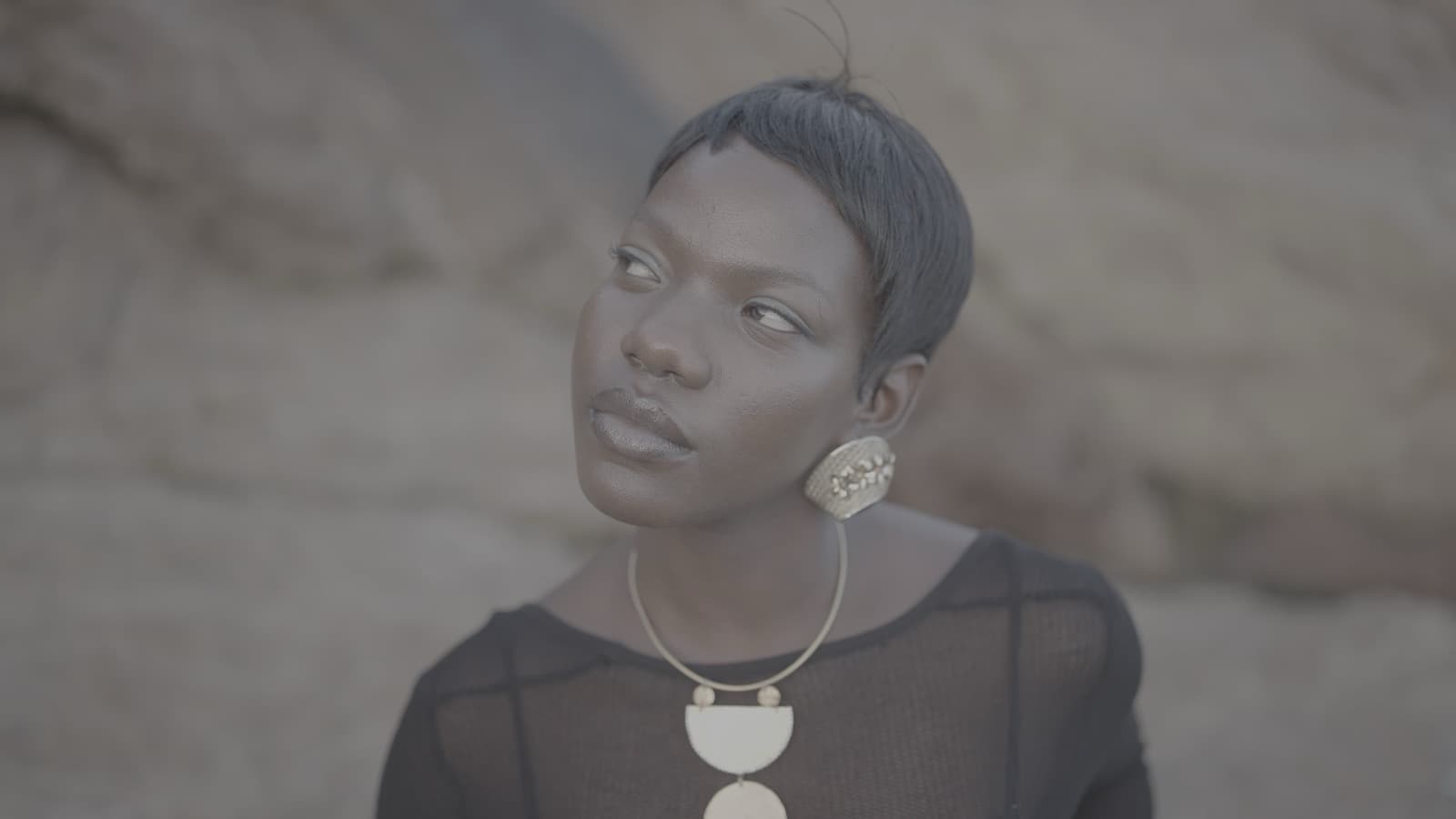 Portrait against desert rock
